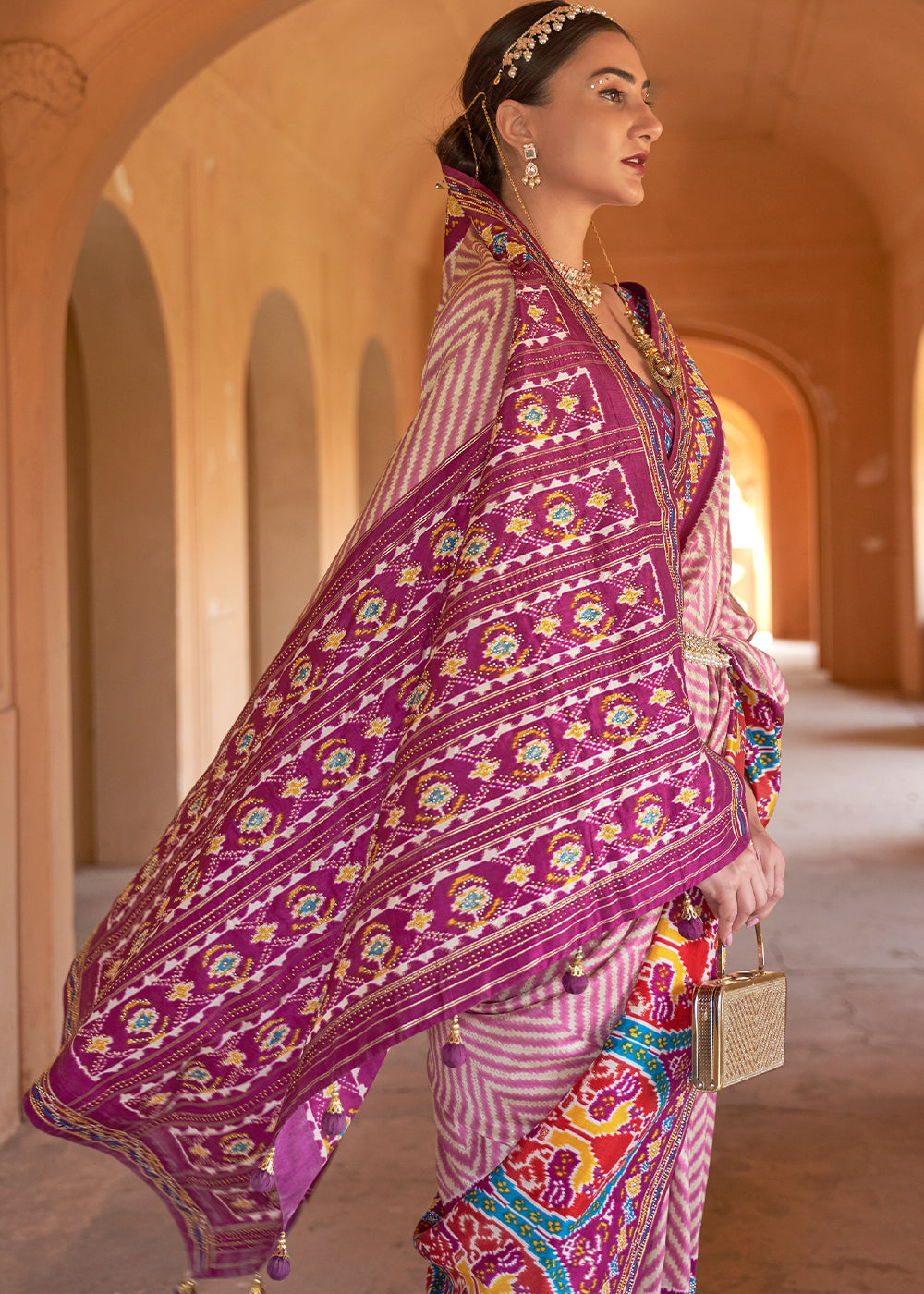 Elegance Personified: The Gajari Off-White Patola Silk Saree