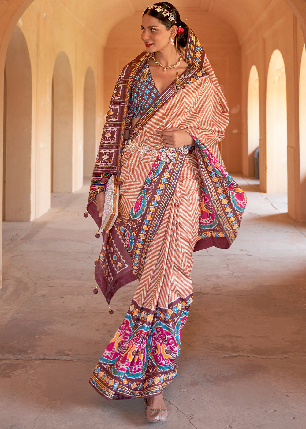 Enchanting Light Pink Patola Silk Saree with Off-White Details