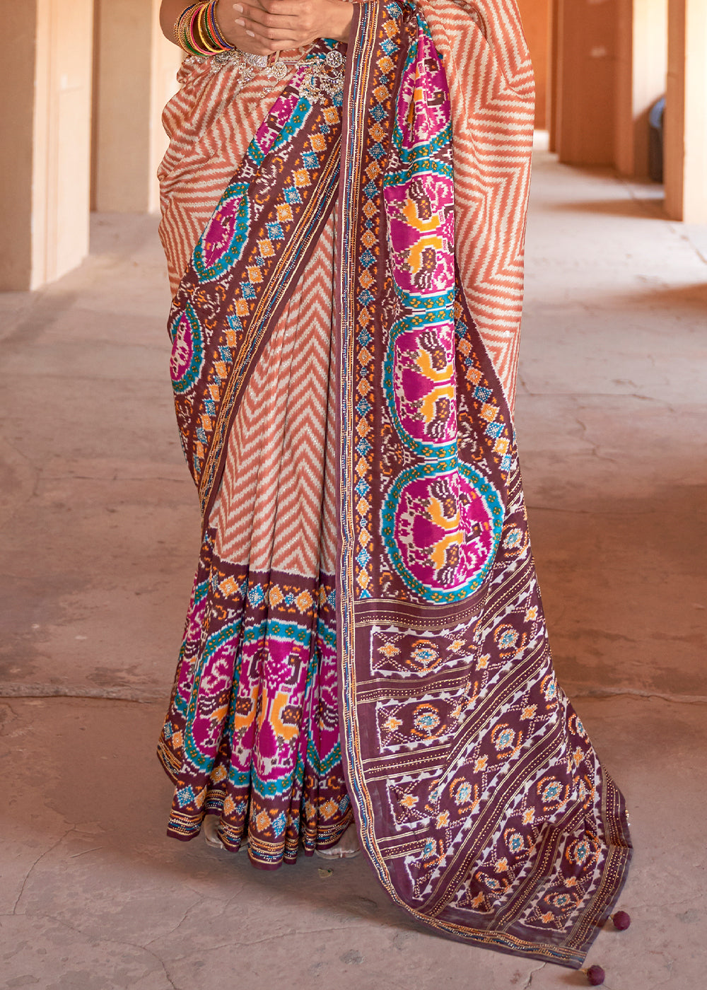 Earthen Elegance: Shades of Brown Printed Patola Silk Saree with Zari Border