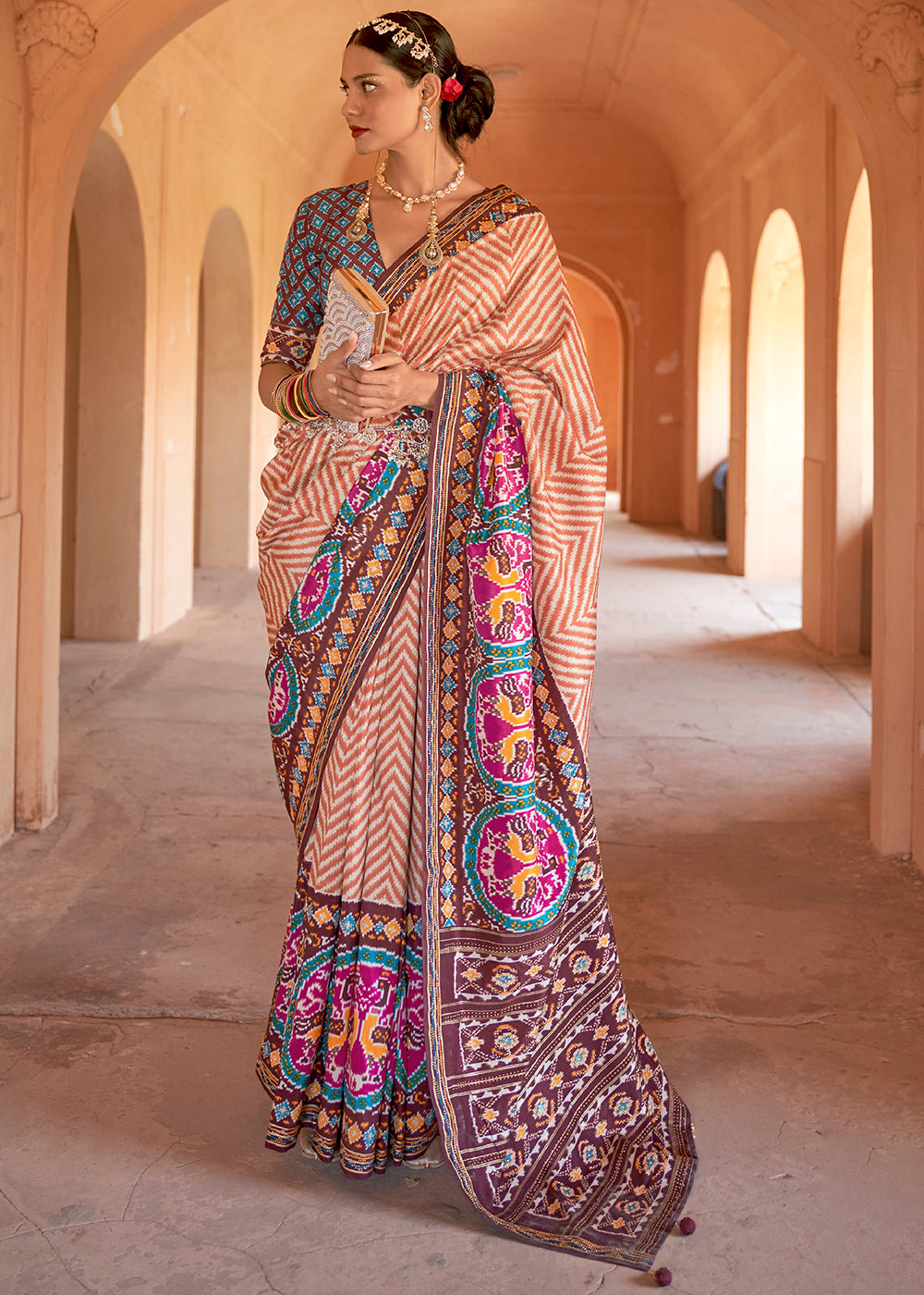 Enchanting Light Pink Patola Silk Saree with Off-White Details