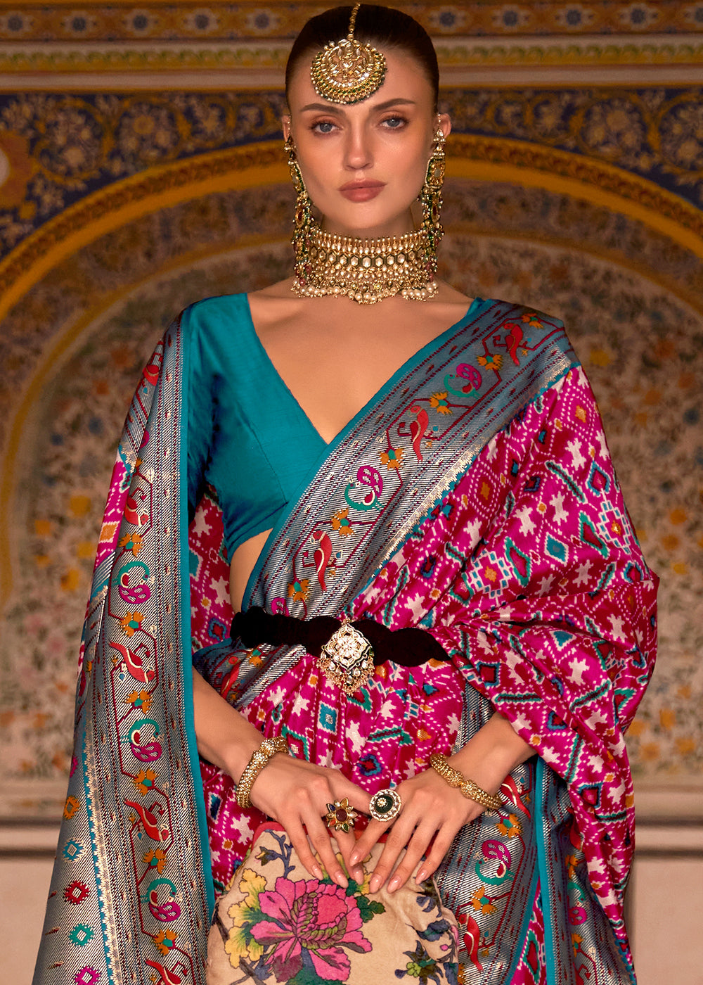 Mesmerizing Pink and Blue Patola Silk Saree - A Beautiful Blend of Colors