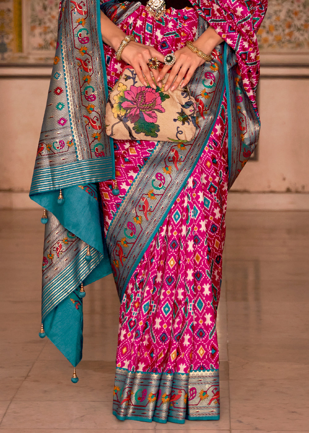 Mesmerizing Pink and Blue Patola Silk Saree - A Beautiful Blend of Colors