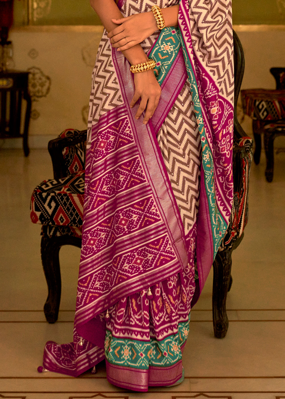 Vibrant Pink Patola Silk Saree for a Bold and Eye-Catching Look