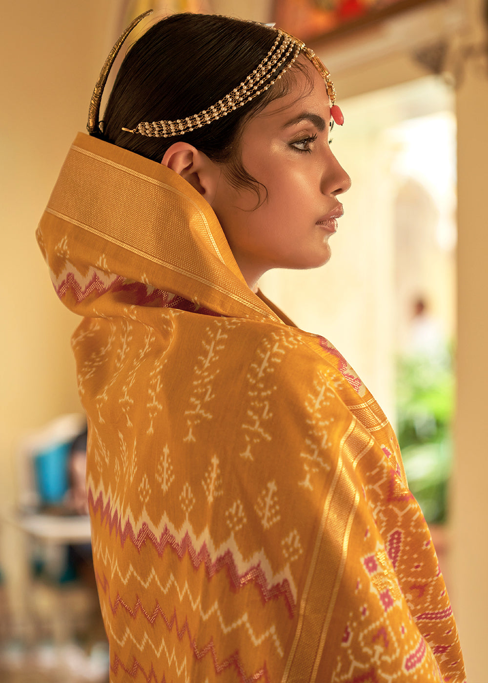 Sunny Splendor: A Yellow Patola Woven Silk Saree Fit for Goddesses