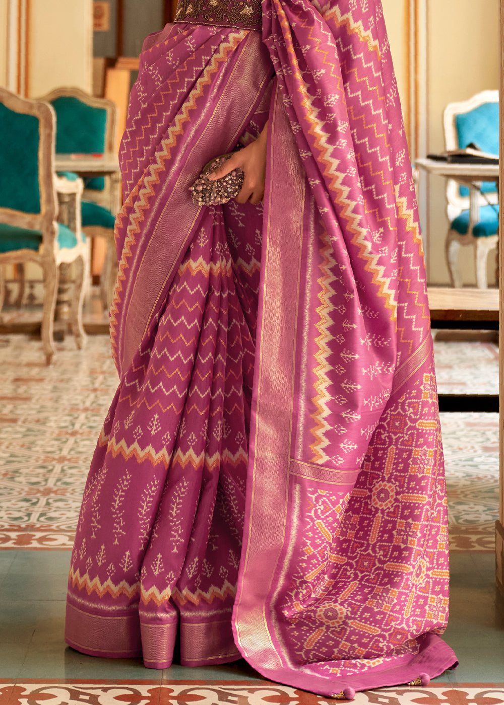 Blushing Beauty: A Pink Patola Woven Silk Saree Fit for Royalty