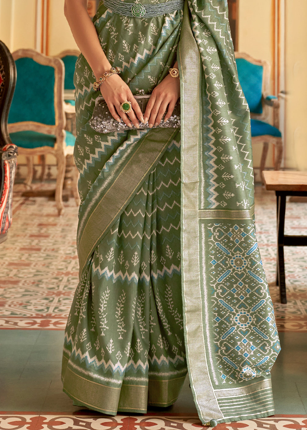 Emerald Enchantment: A Green Patola Woven Silk Saree Fit for Goddesses