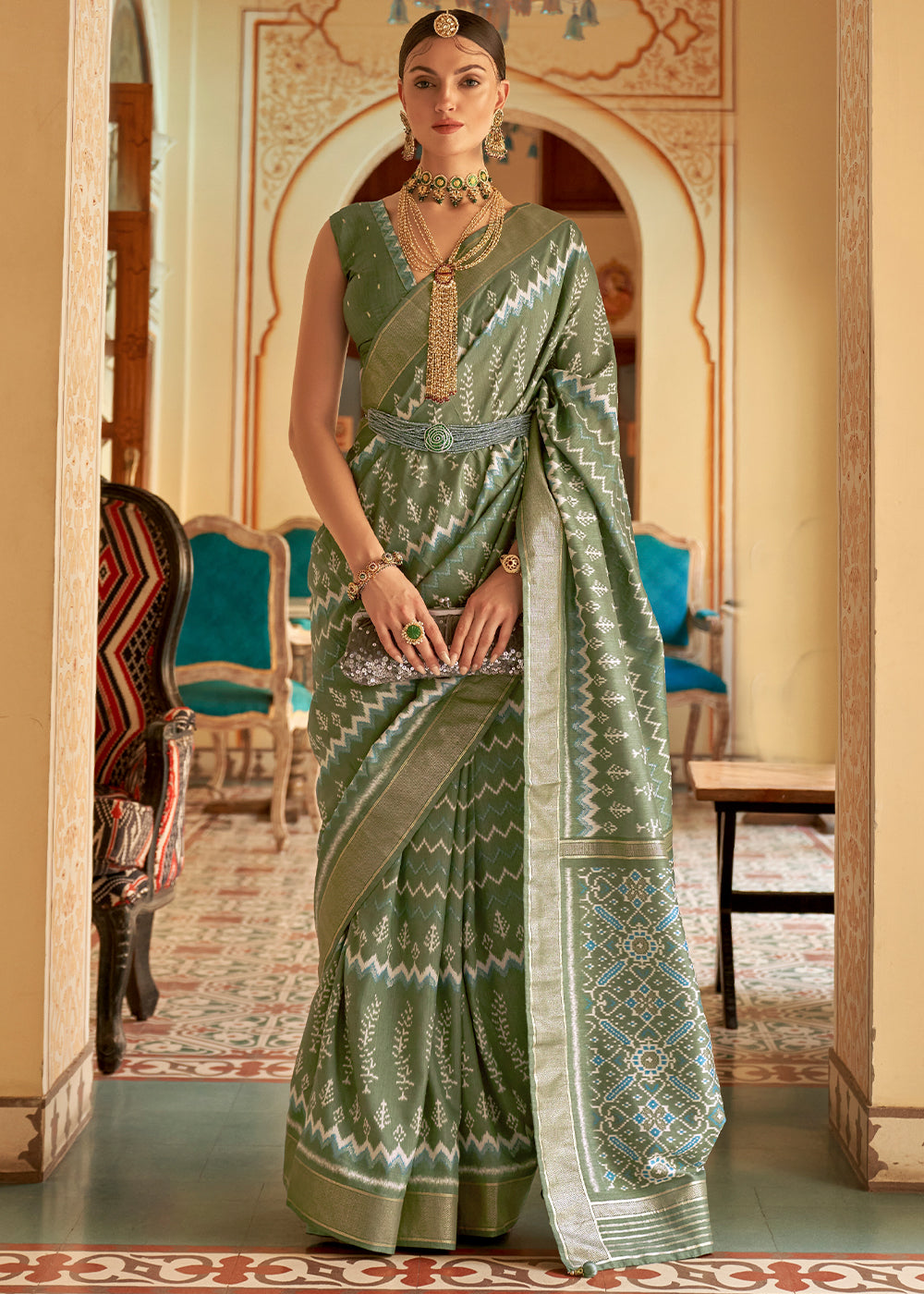 Emerald Enchantment: A Green Patola Woven Silk Saree Fit for Goddesses