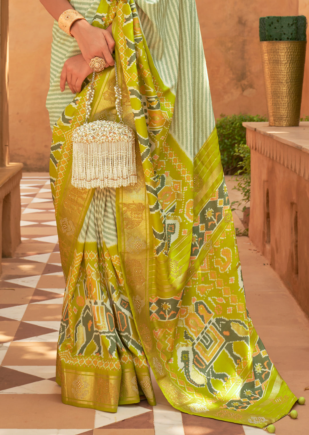 The Exquisite Beauty of Handwoven Green Patola Silk Saree