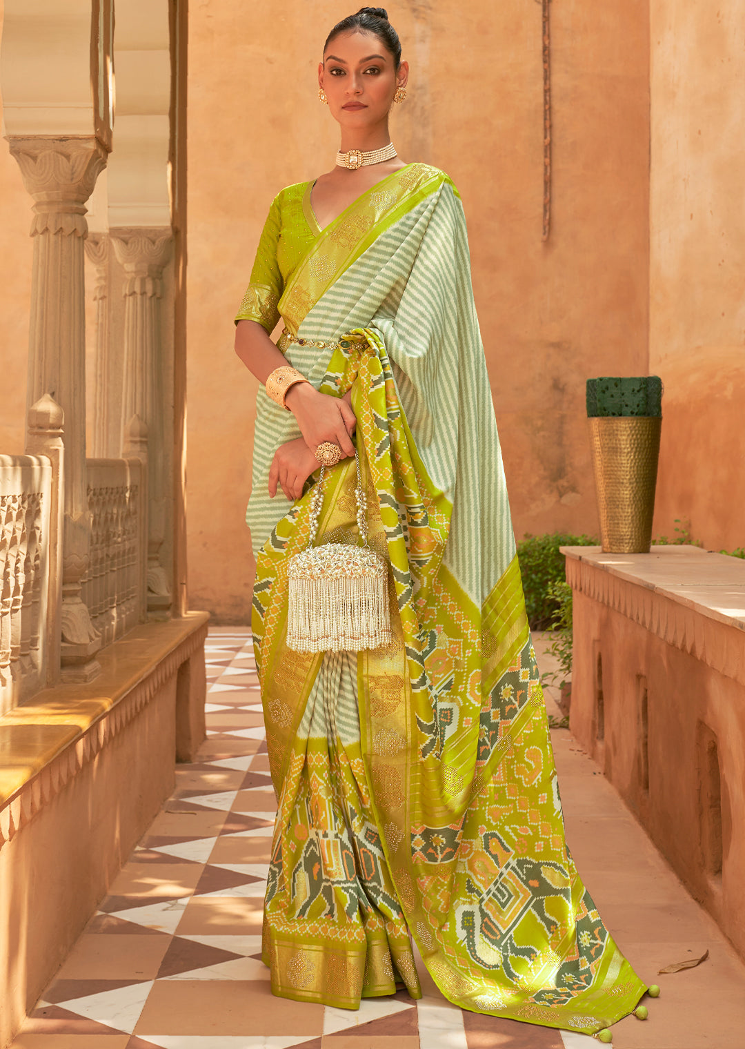 The Exquisite Beauty of Handwoven Green Patola Silk Saree