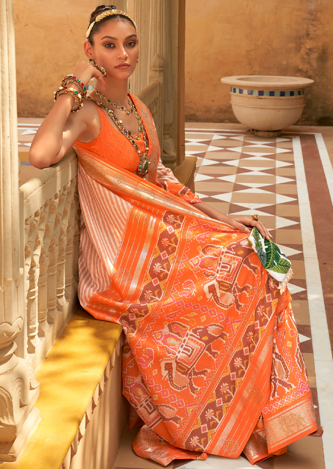 The Vibrant Charm of Orange Patola Saree