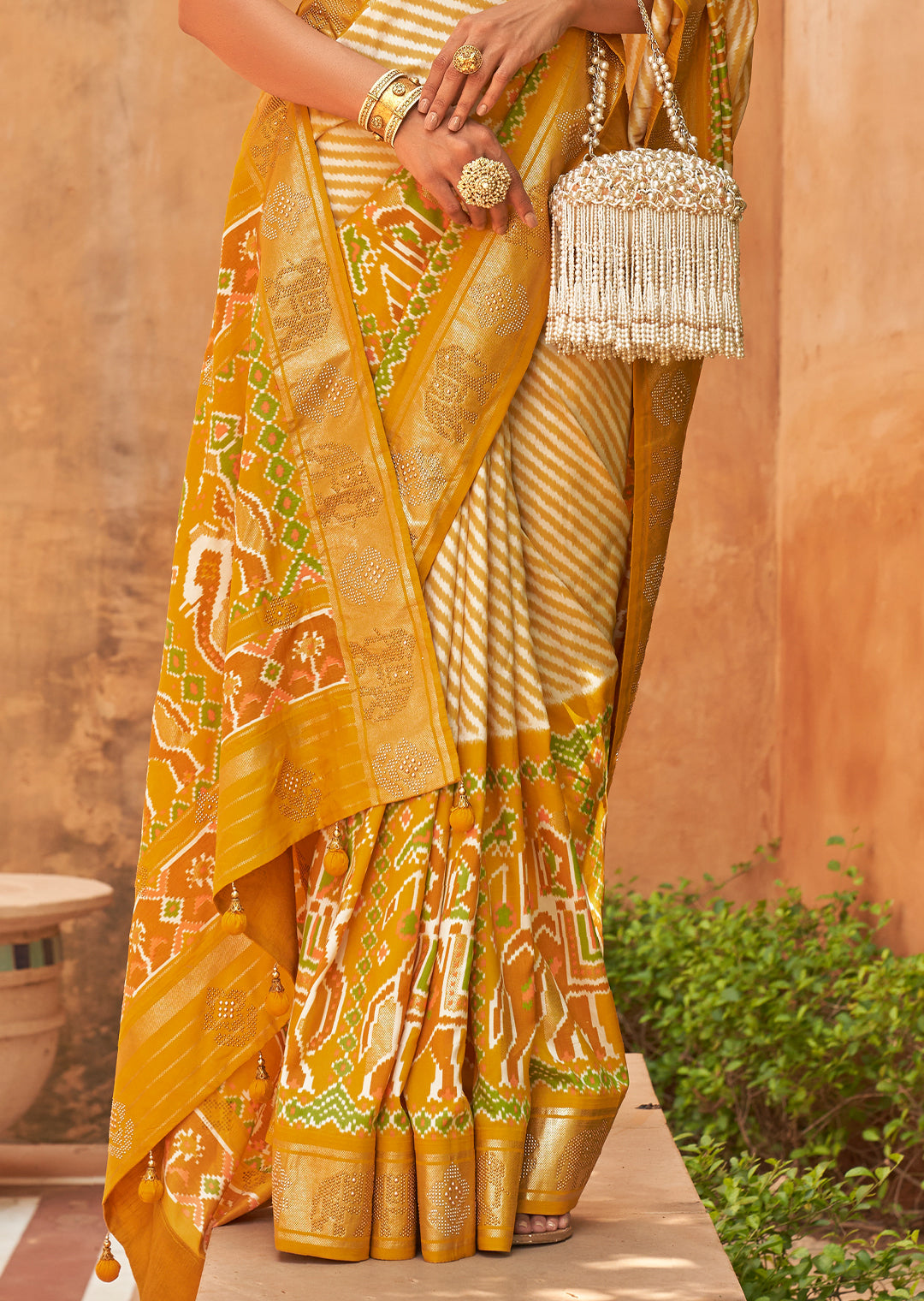 The Artistic Splendor of Handwoven Orange Patola Silk Saree