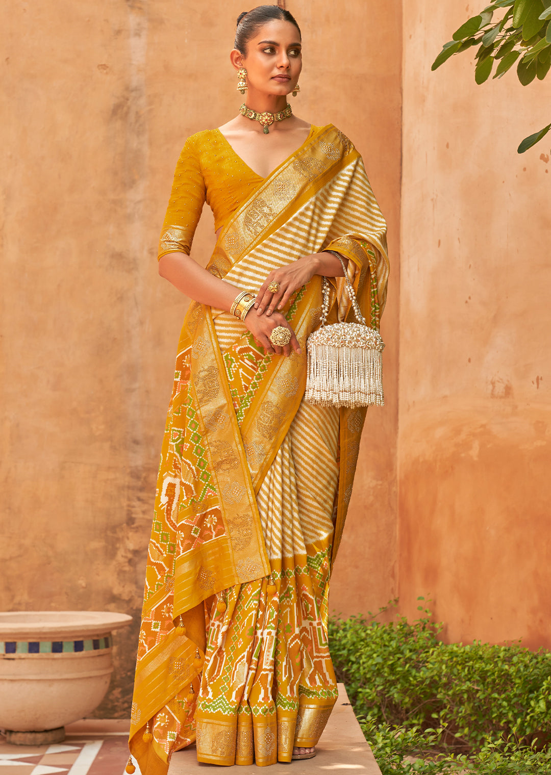 The Artistic Splendor of Handwoven Orange Patola Silk Saree