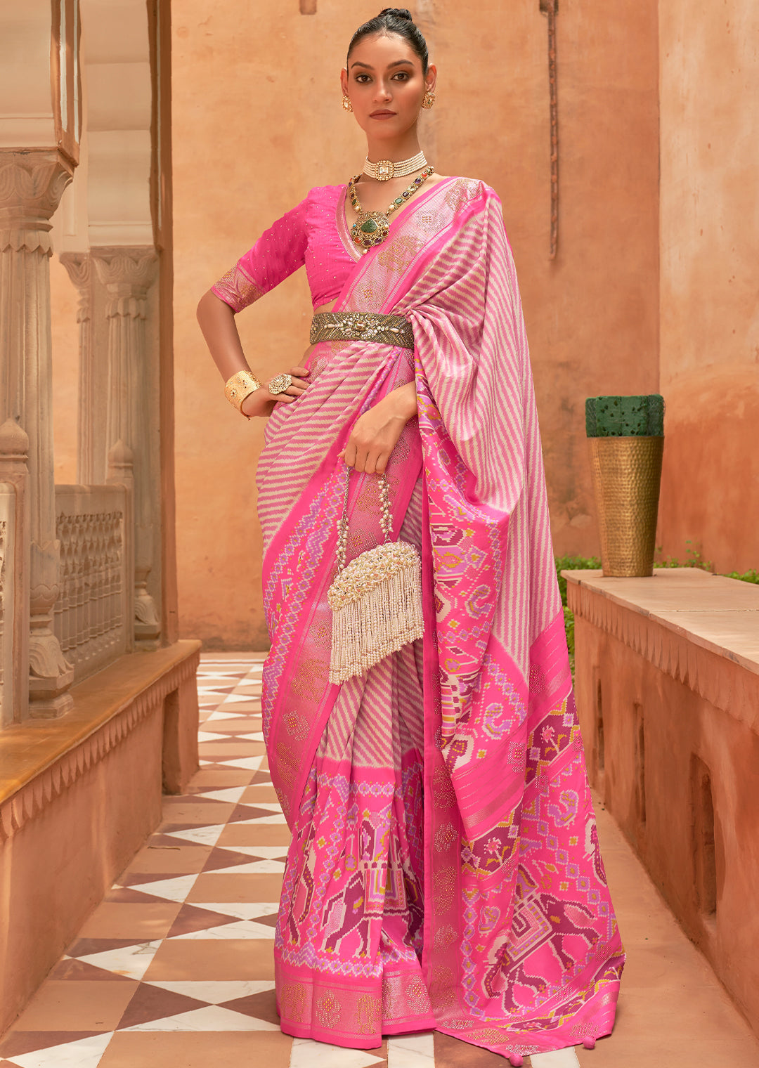 The Delicate Splendor of Handwoven Pink Patola Silk Saree