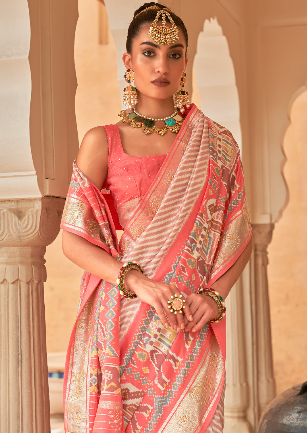 The Feminine Grace of Handwoven Pink Patola Silk Saree