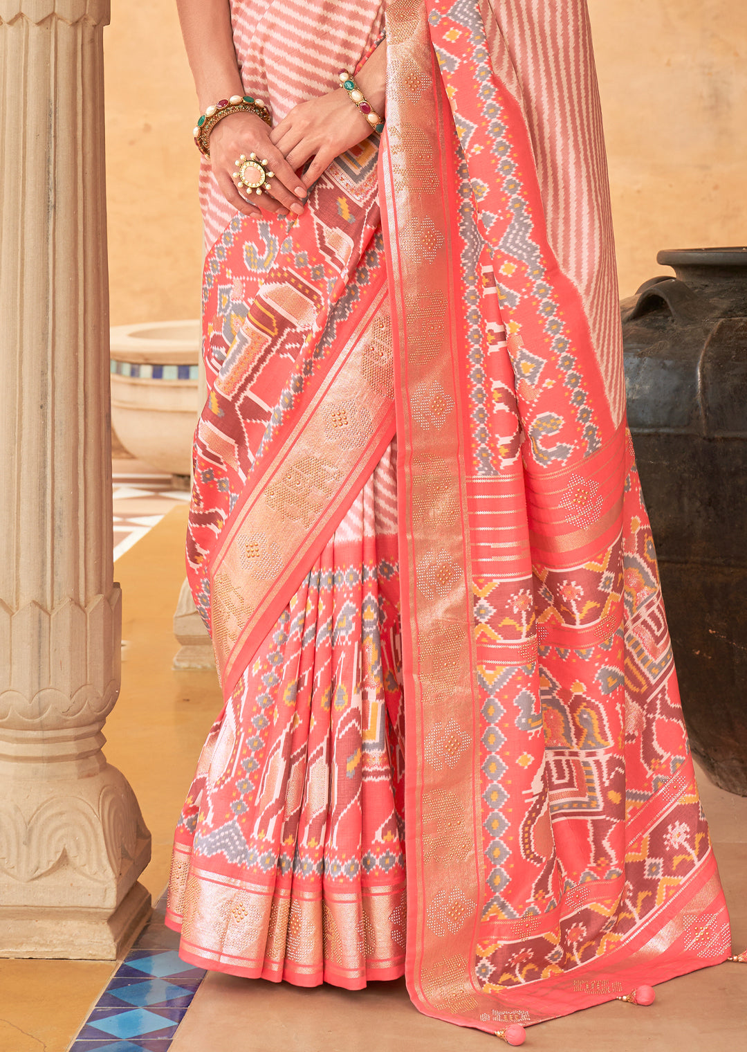 The Feminine Grace of Handwoven Pink Patola Silk Saree