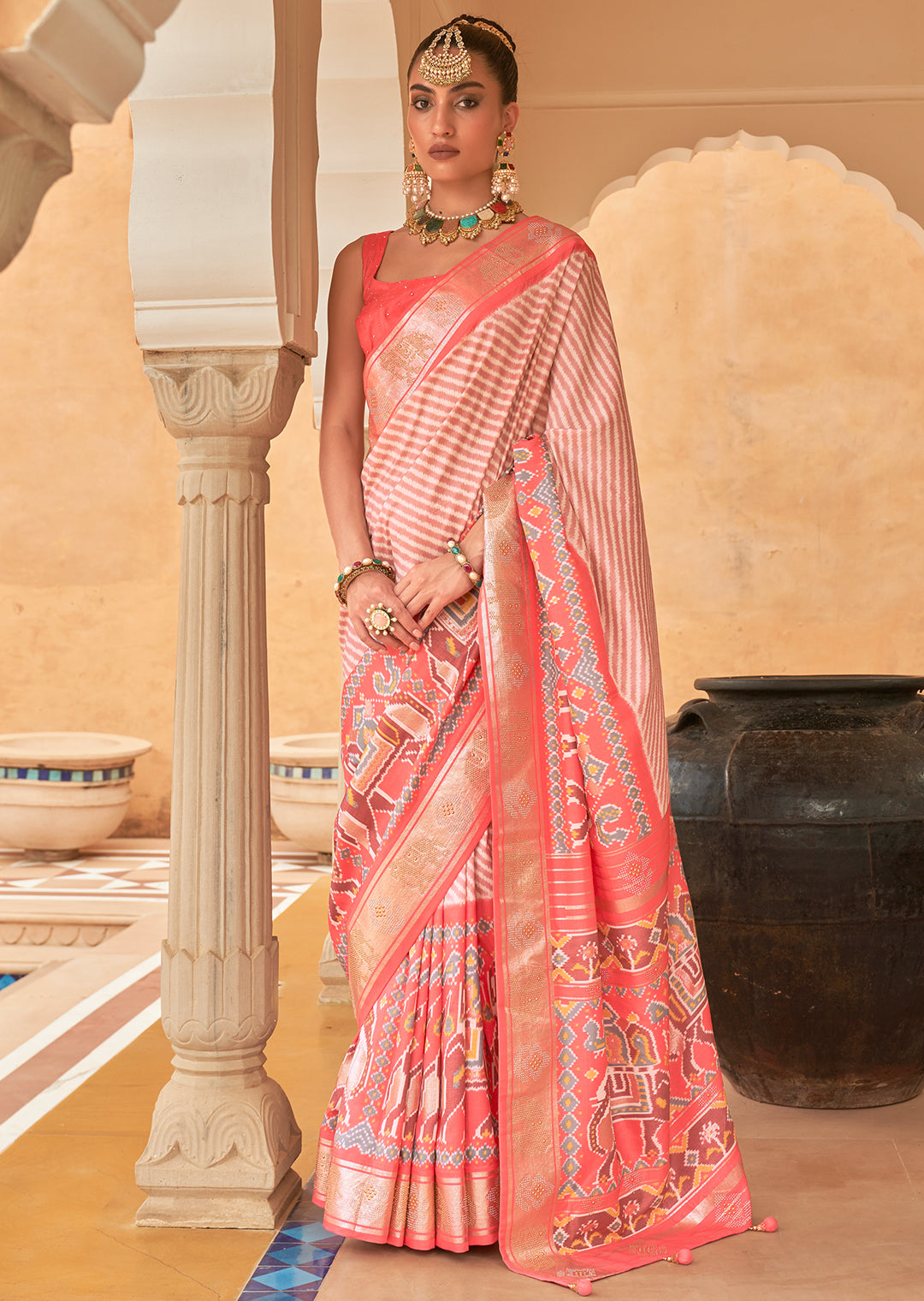 The Feminine Grace of Handwoven Pink Patola Silk Saree