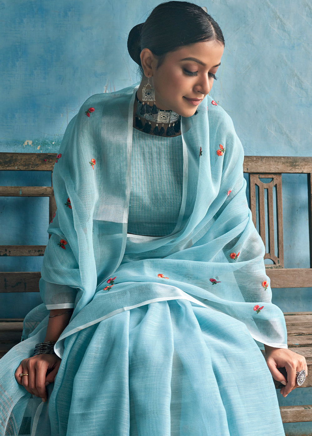 Serene Skies: A Sky Blue Linen Saree for Tranquil Beauty