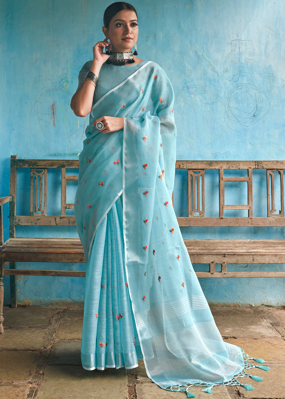 Serene Skies: A Sky Blue Linen Saree for Tranquil Beauty