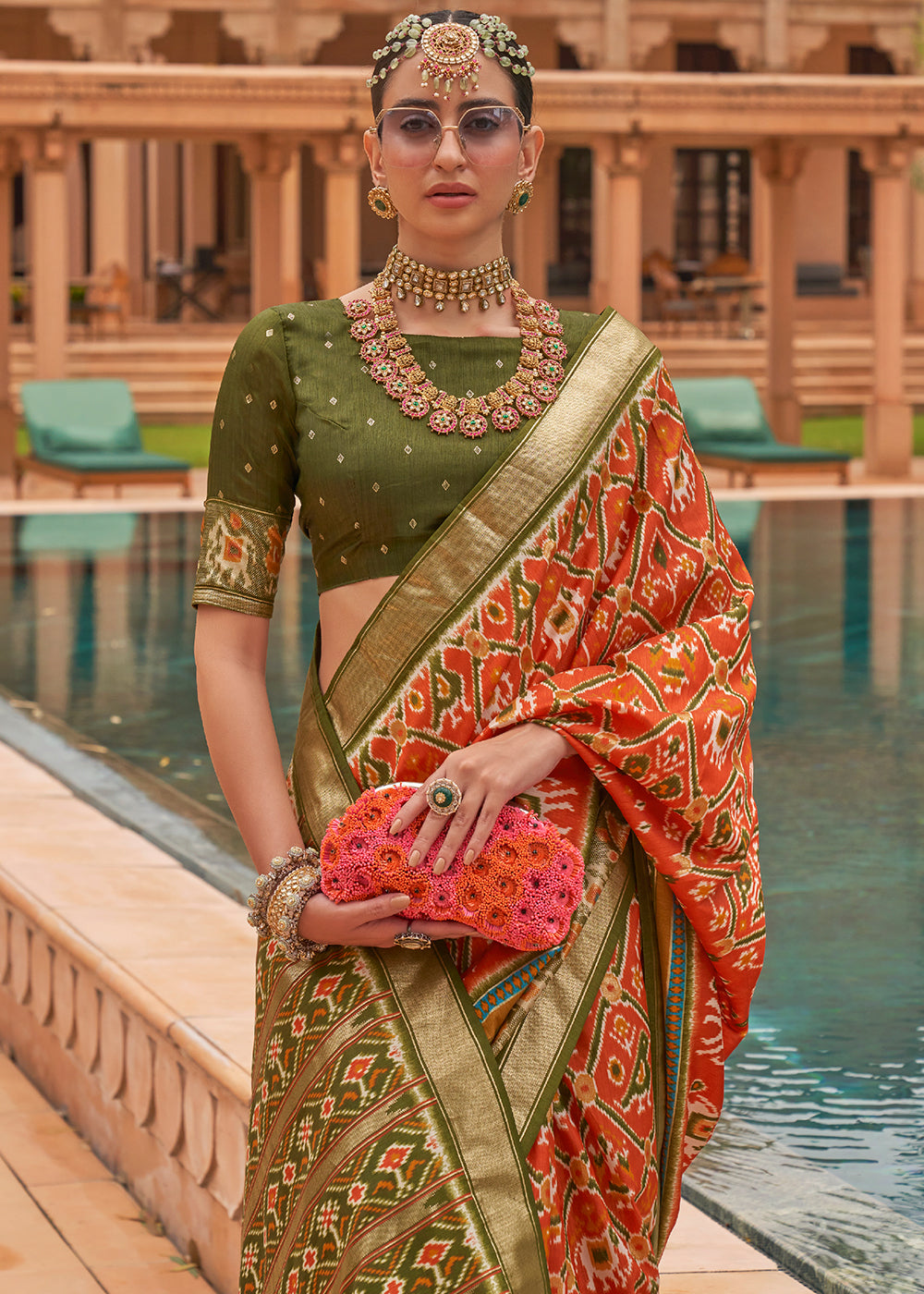 Radiant Tangerine Patola: A Woven Silk Saree for Vibrant Charm