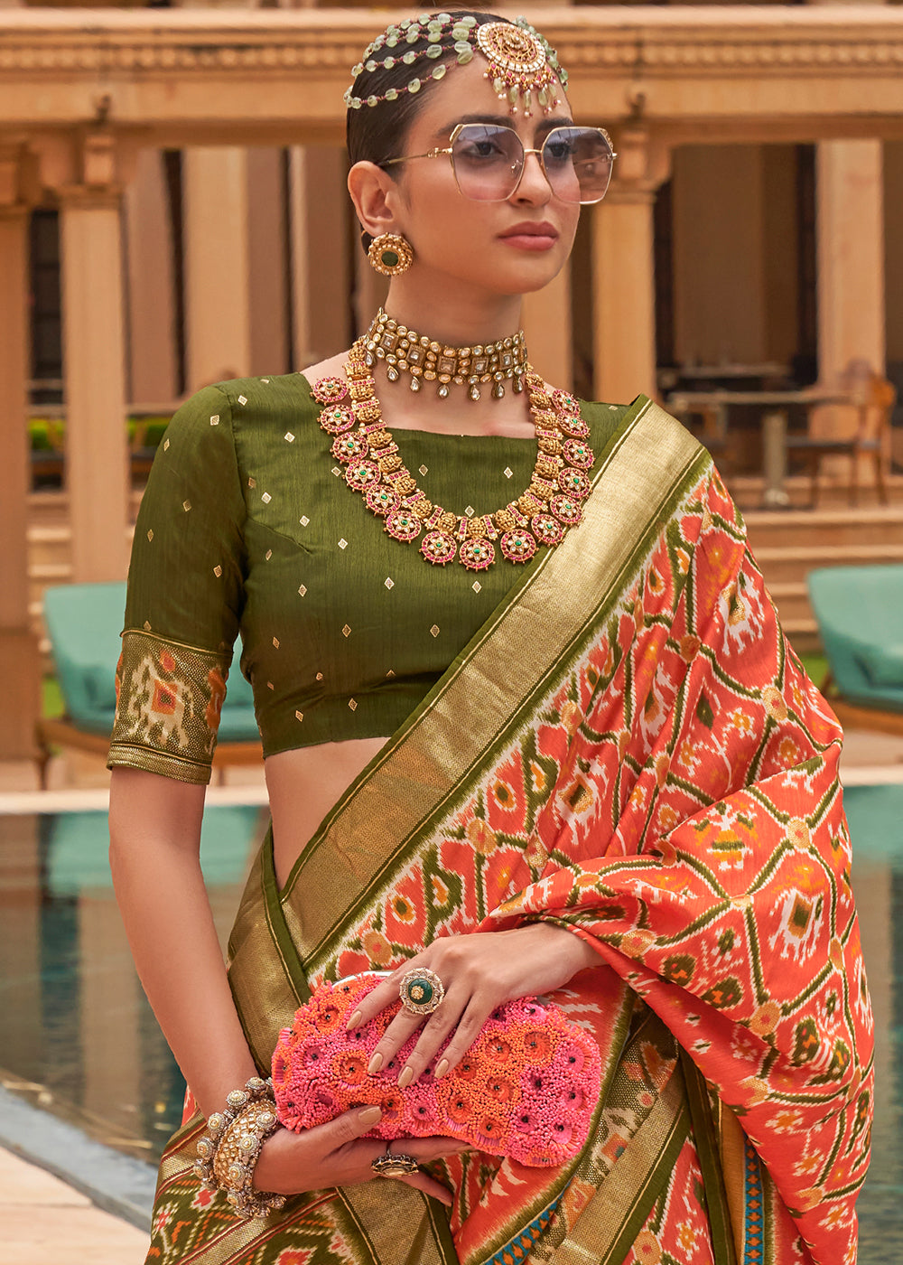 Radiant Tangerine Patola: A Woven Silk Saree for Vibrant Charm