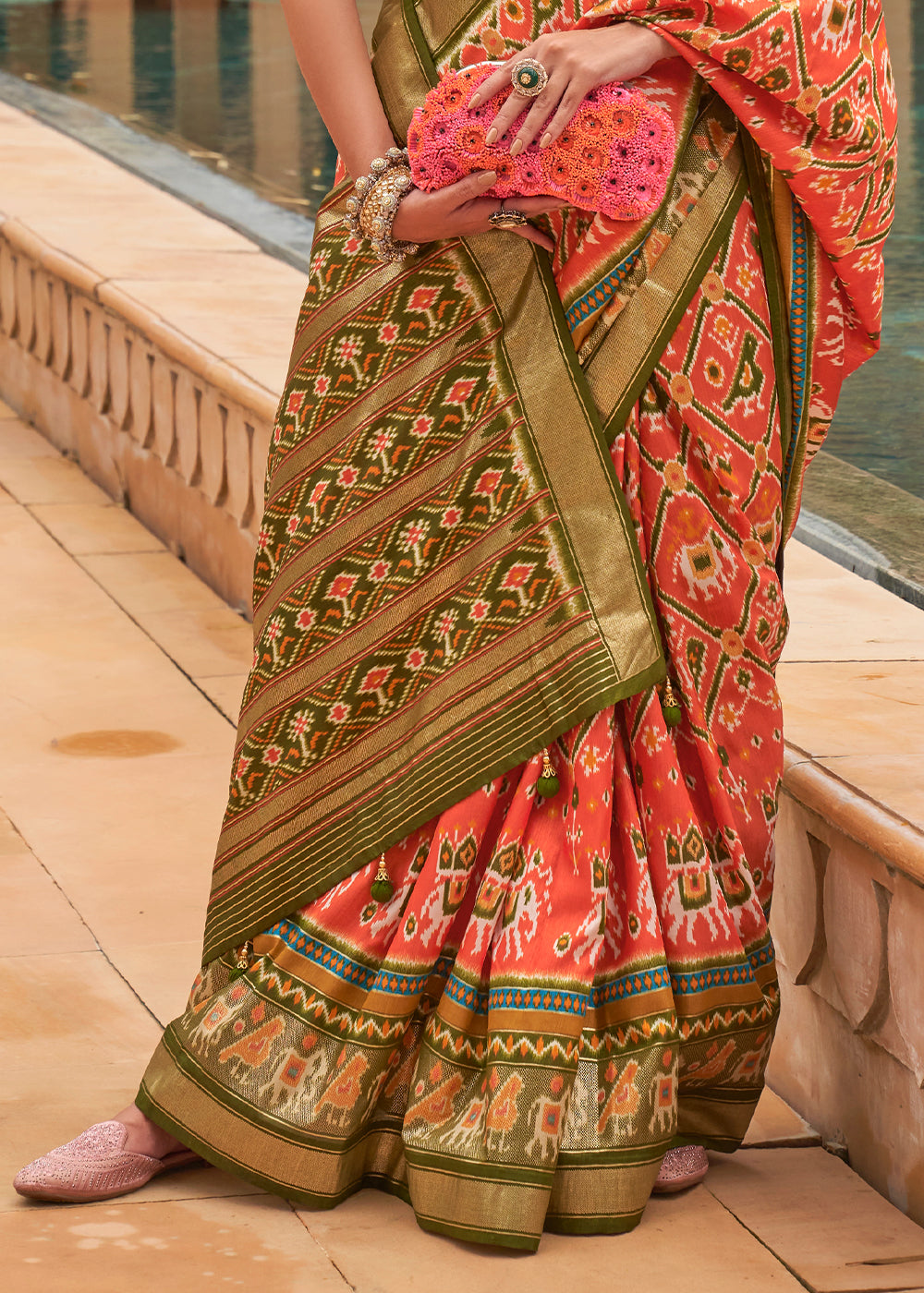 Radiant Tangerine Patola: A Woven Silk Saree for Vibrant Charm