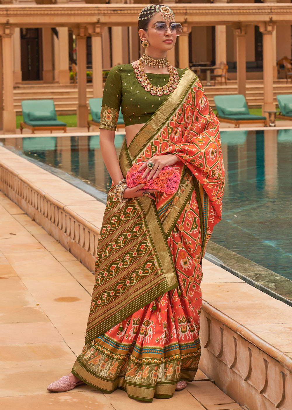 Radiant Tangerine Patola: A Woven Silk Saree for Vibrant Charm