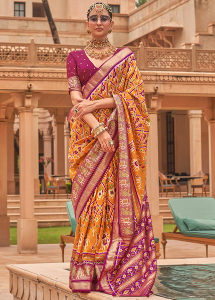 Earthy Elegance: A Brown Woven Patola Silk Saree for Natural Beauty