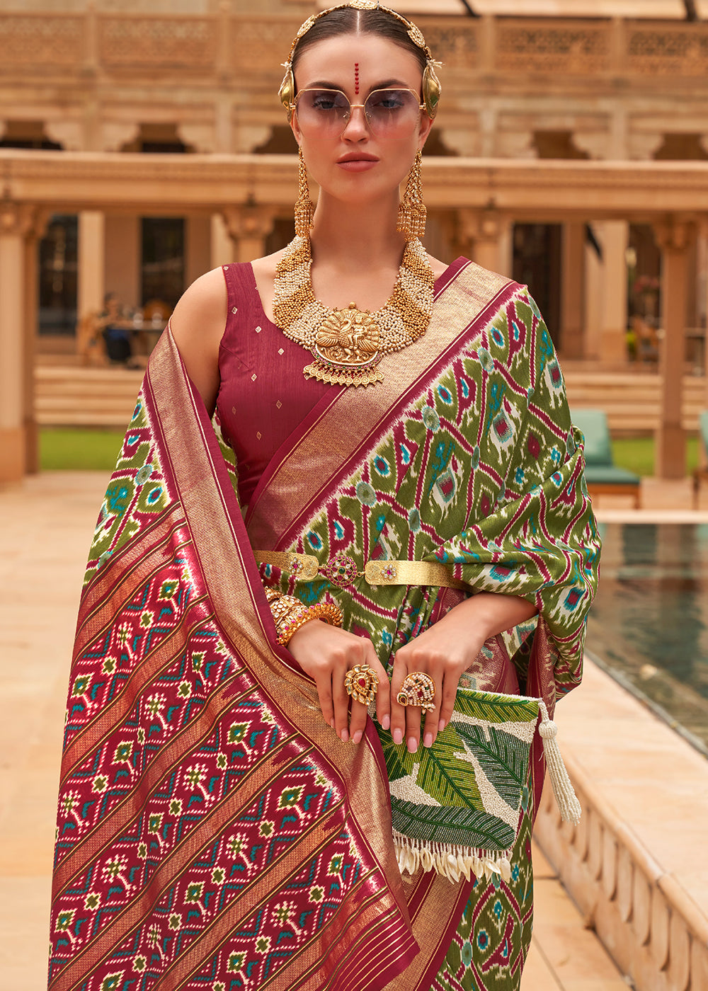 Emerald Elegance: A Woven Silk Saree for Timeless Grace