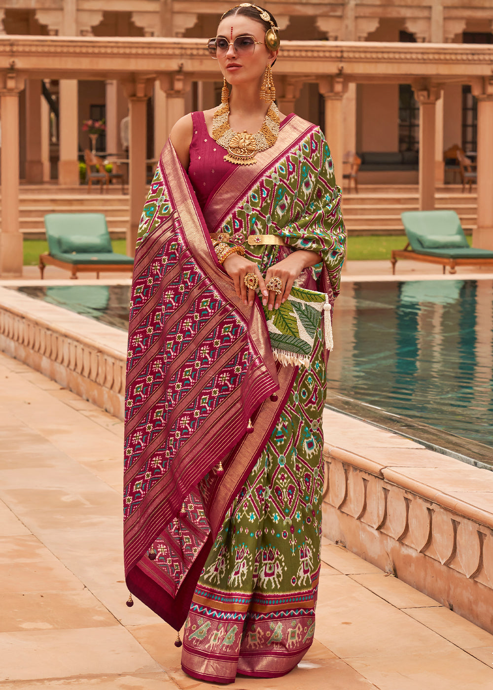 Emerald Elegance: A Woven Silk Saree for Timeless Grace