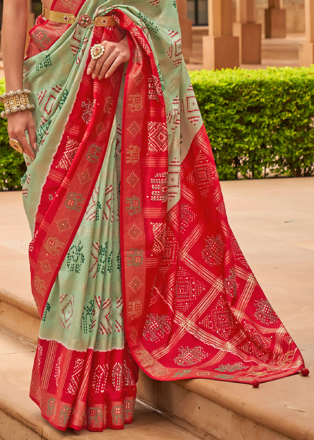 The Striking Contrasts of Green and Red in Patola Saree