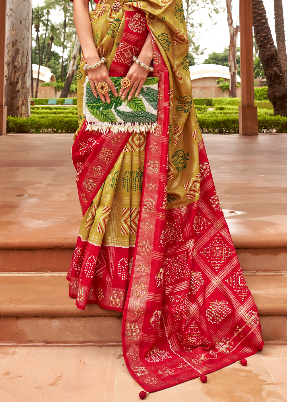 The Vibrant Fusion of Green and Red in Patola Saree