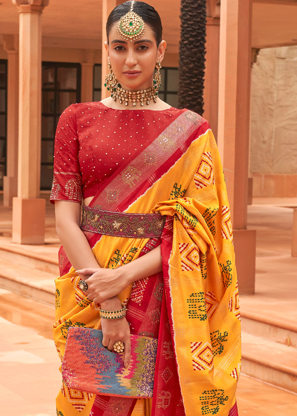 The Bright and Bold Yellow and Red Patola Saree