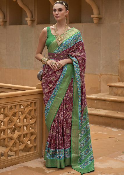 Captivate Hearts with the Cherry Red Woven Patola Silk Saree