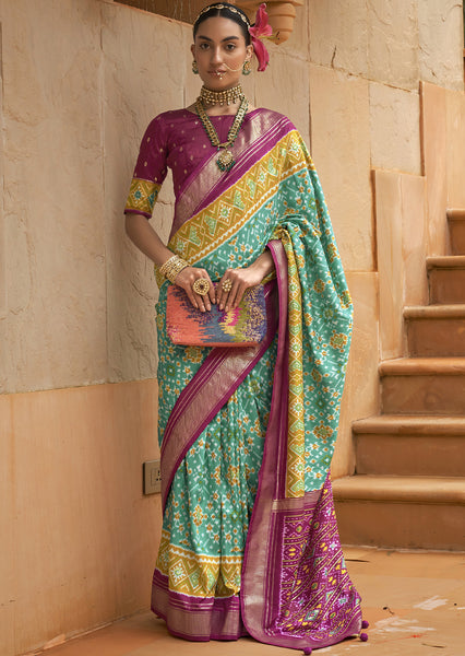 Embrace Nature's Beauty with the Lawn Green Woven Patola Silk Saree
