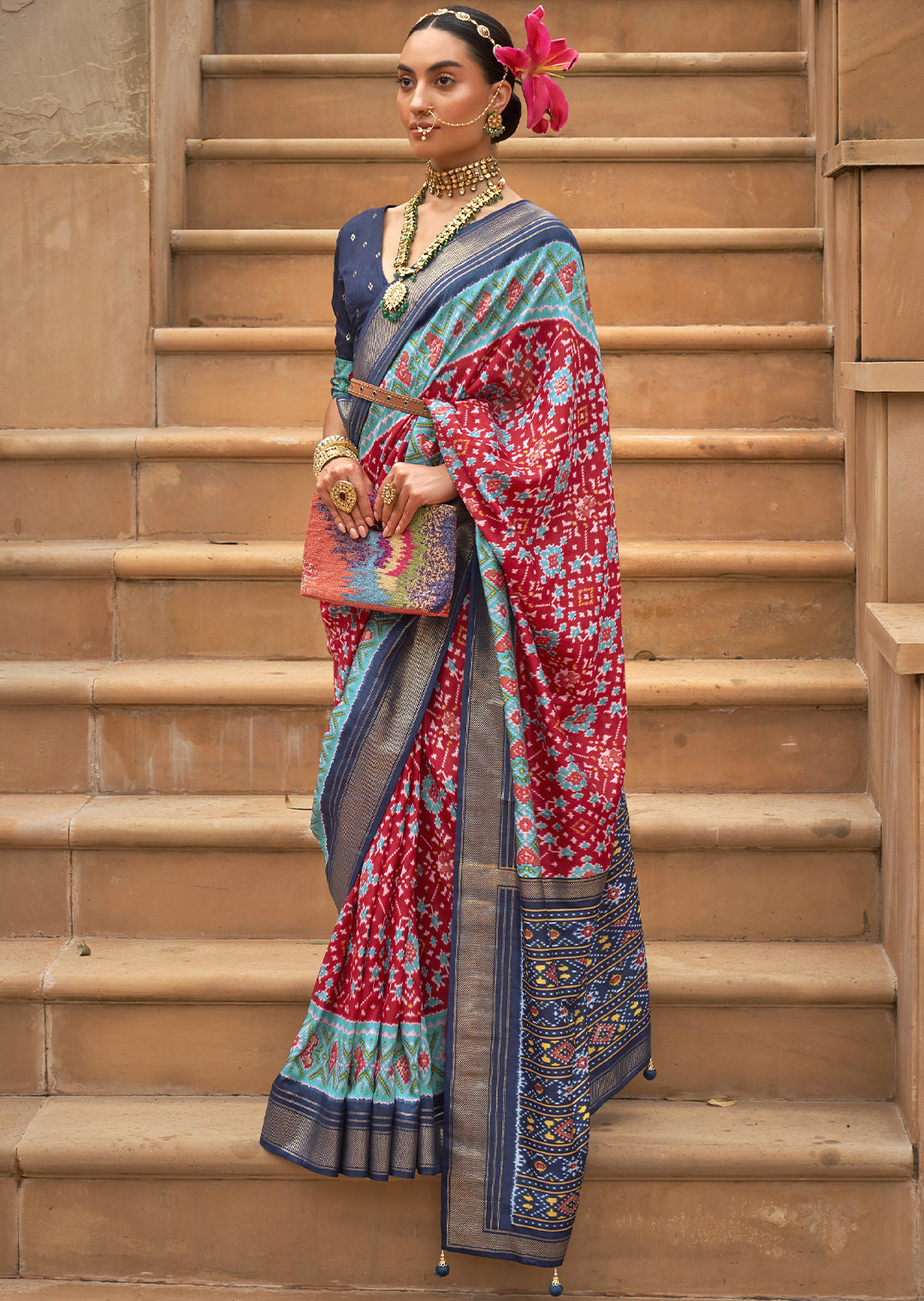 Unleash the Fiery Passion with the Ruby Red Woven Patola Silk Saree