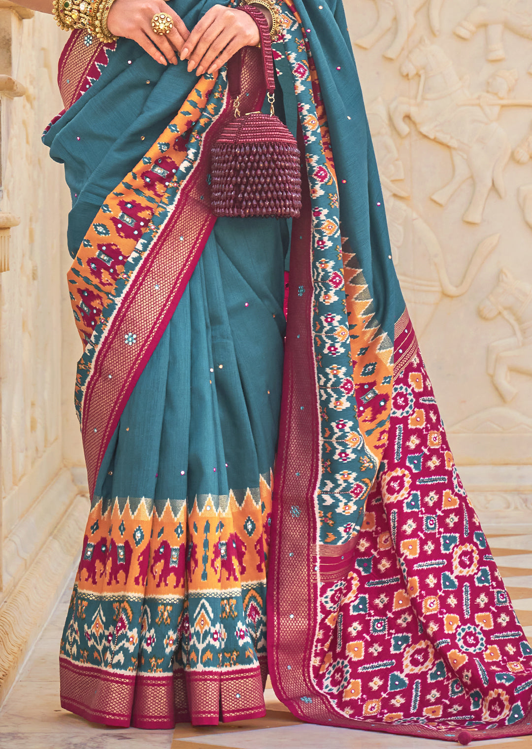 Embody Serenity and Tranquility with the Stone Blue Woven Patola Silk Saree