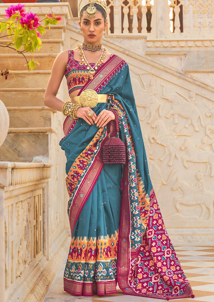 Embody Serenity and Tranquility with the Stone Blue Woven Patola Silk Saree