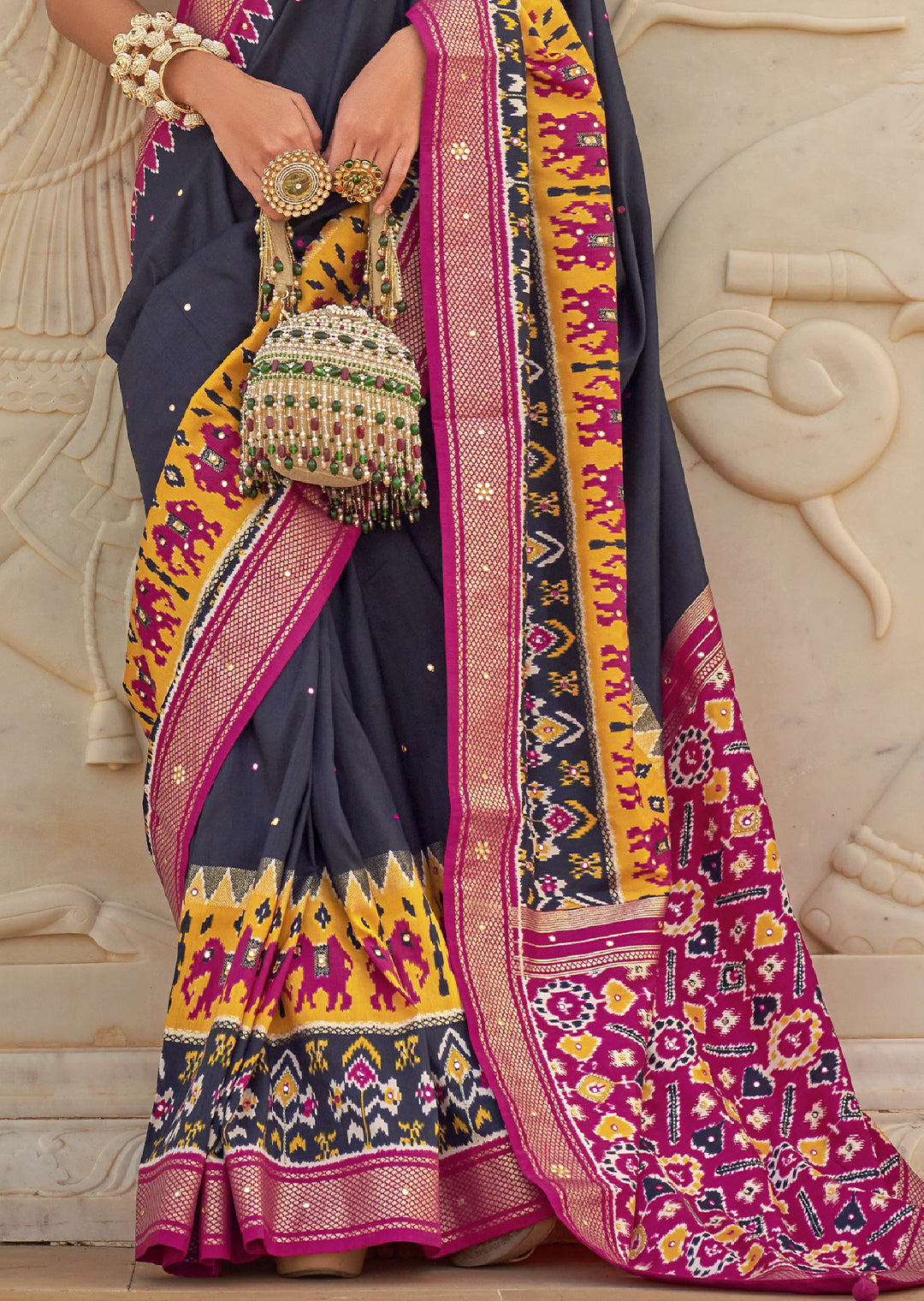 Radiate Elegance with the Steel Blue Woven Patola Silk Saree