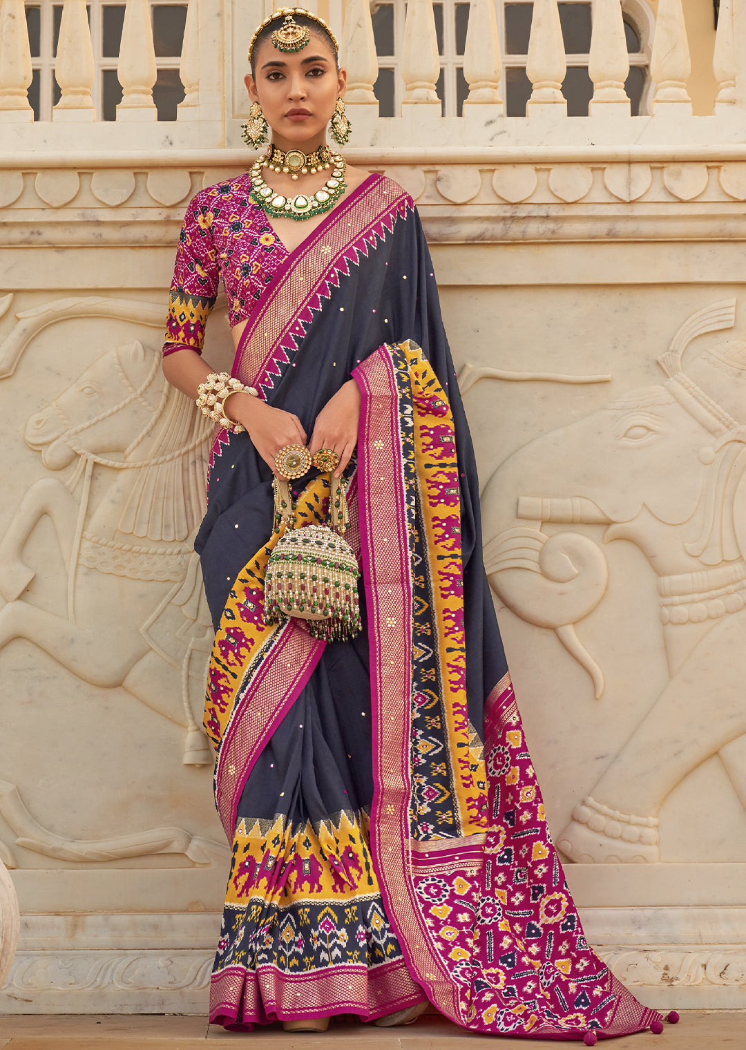 Radiate Elegance with the Steel Blue Woven Patola Silk Saree