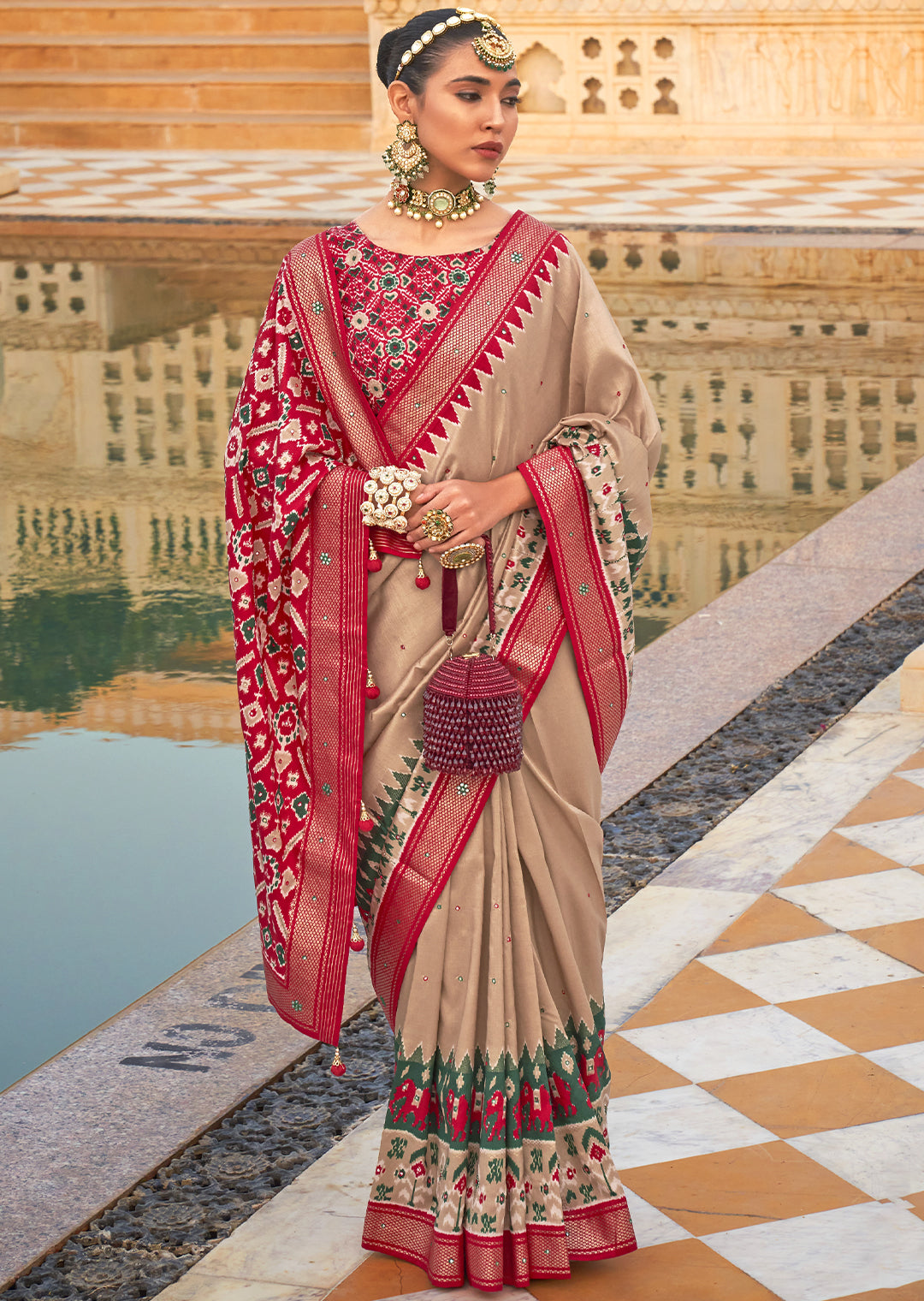 Elegant Sand Beige Woven Patola Silk Saree"