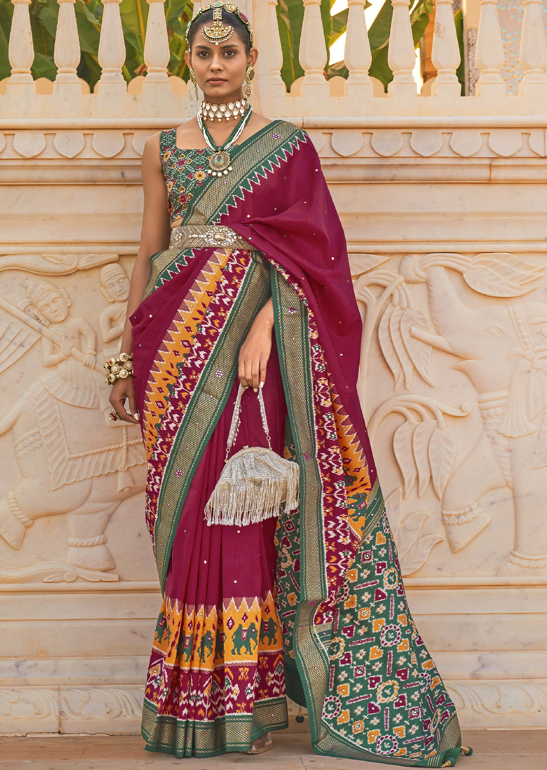 Radiant and Timeless: The Candy Wine Red Woven Patola Silk Saree